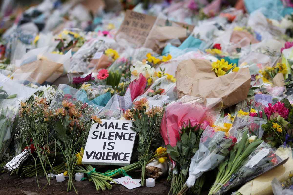 Flowers and messages are seen at a memorial site at the Clapham Common Bandstand, following the kidnap and murder of Sarah Everard, in London, Britain March 16, 2021. REUTERS