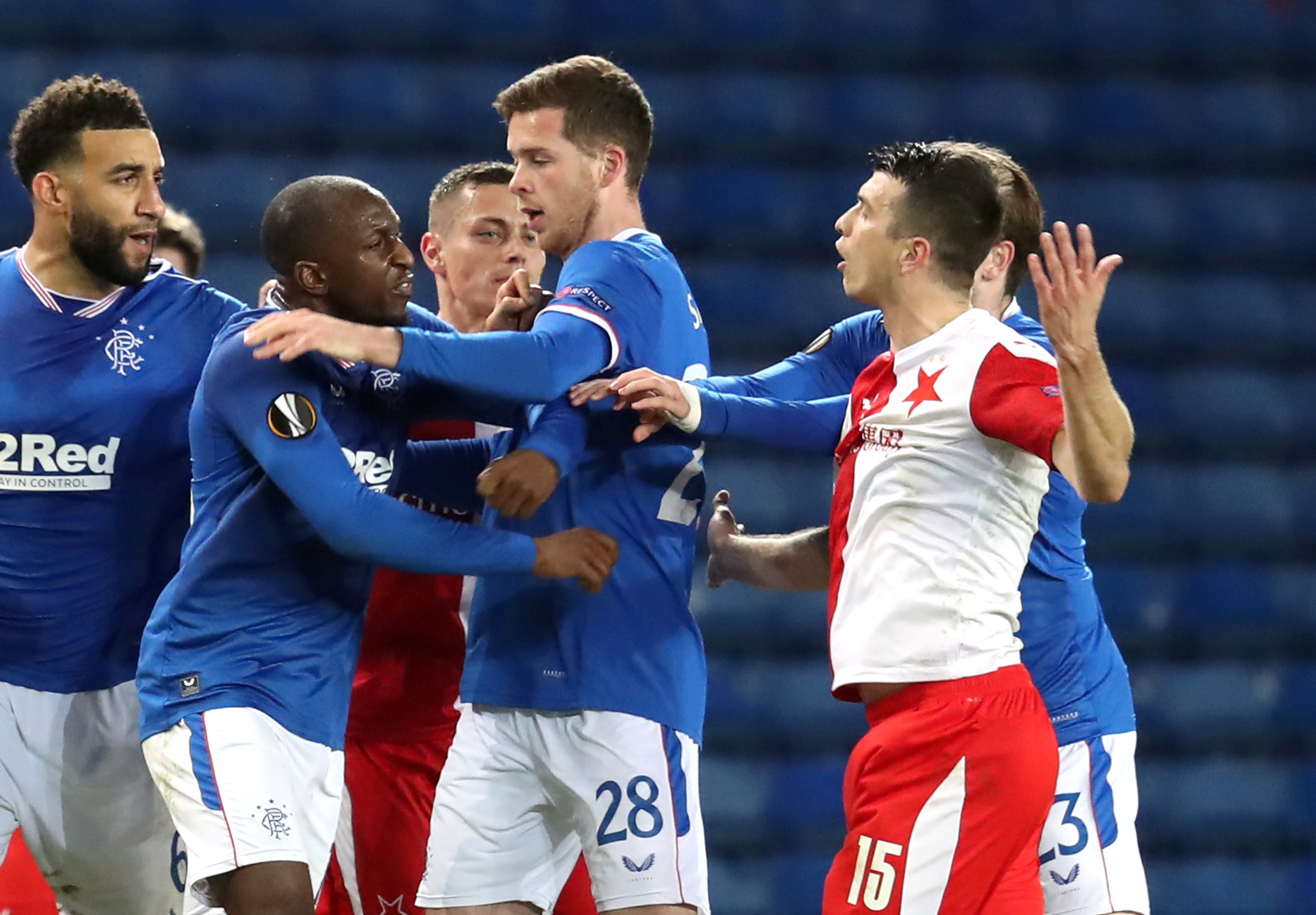 Soccer Football - Europa League - Round of 16 Second Leg - Rangers v Slavia Prague - Ibrox Stadium, Glasgow, Scotland, Britain - March 18, 2021  Slavia Prague's Ondrej Kudela clashes with Rangers' Glen Kamara. Picture taken March 18, 2021.  Pool via REUTERS