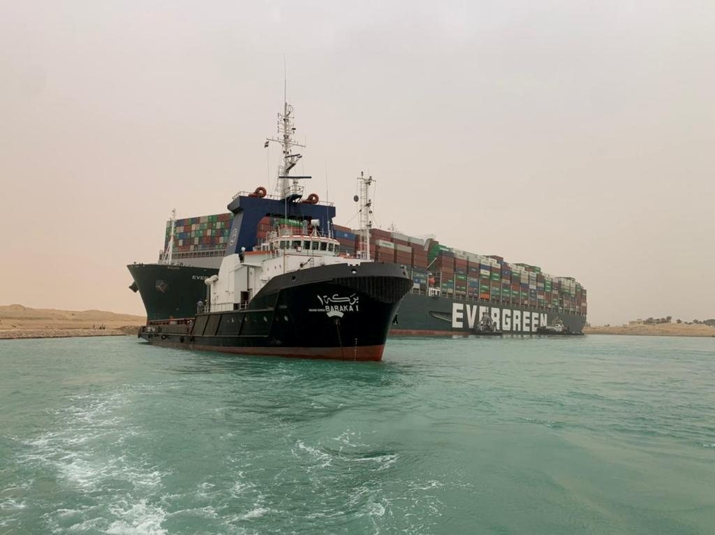 FILE PHOTO: A container ship which was hit by strong wind and ran aground is pictured in Suez Canal, Egypt March 24, 2021. SUEZ CANAL AUTHORITY