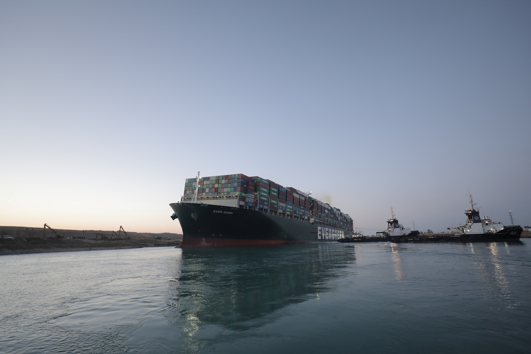 A view shows the container ship Ever Given, one of the world's largest container ships, after it was partially refloated, in Suez Canal, Egypt March 29, 2021. Suez Canal Authority