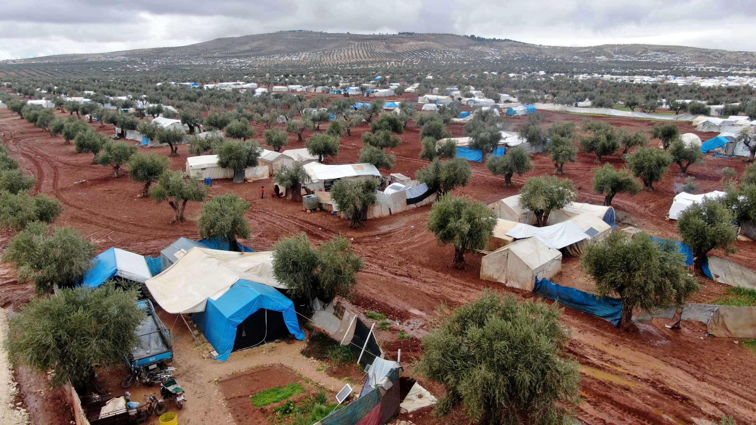A general view shows tents housing internally displaced Syrians, in northern Aleppo near the Syrian-Turkish border, Syria February 17, 2021. Picture taken February 17, 2021. Picture taken with a drone. REUTERS