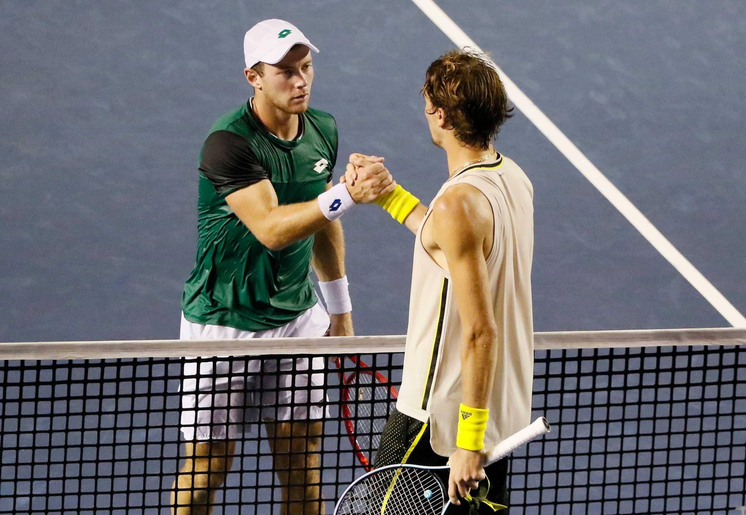 Tennis - ATP 500 - Mexican Open - The Fairmont Acapulco Princess, Acapulco, Mexico - March 19, 2021 Germany's Alexander Zverev  shakes hands with Germany's Dominik Koepfer after winning his semi final match REUTERS