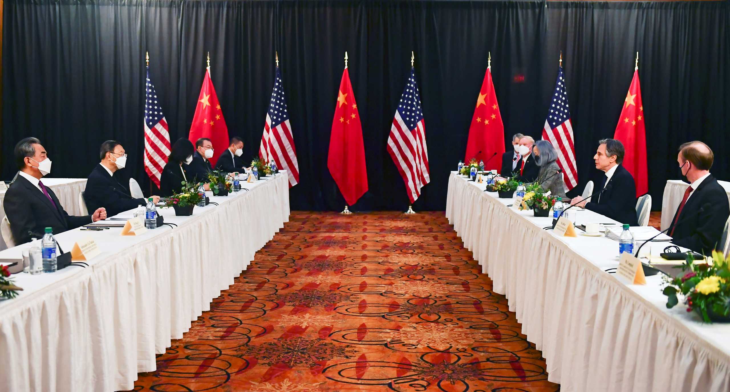 U.S. Secretary of State Antony Blinken (2nd R), joined by National Security Advisor Jake Sullivan (R), speaks while facing Yang Jiechi (2nd L), director of the Central Foreign Affairs Commission Office, and Wang Yi (L), China's State Councilor and Foreign Minister, at the opening session of U.S.-China talks at the Captain Cook Hotel in Anchorage, Alaska, U.S. March 18, 2021. Frederic J. Brown
