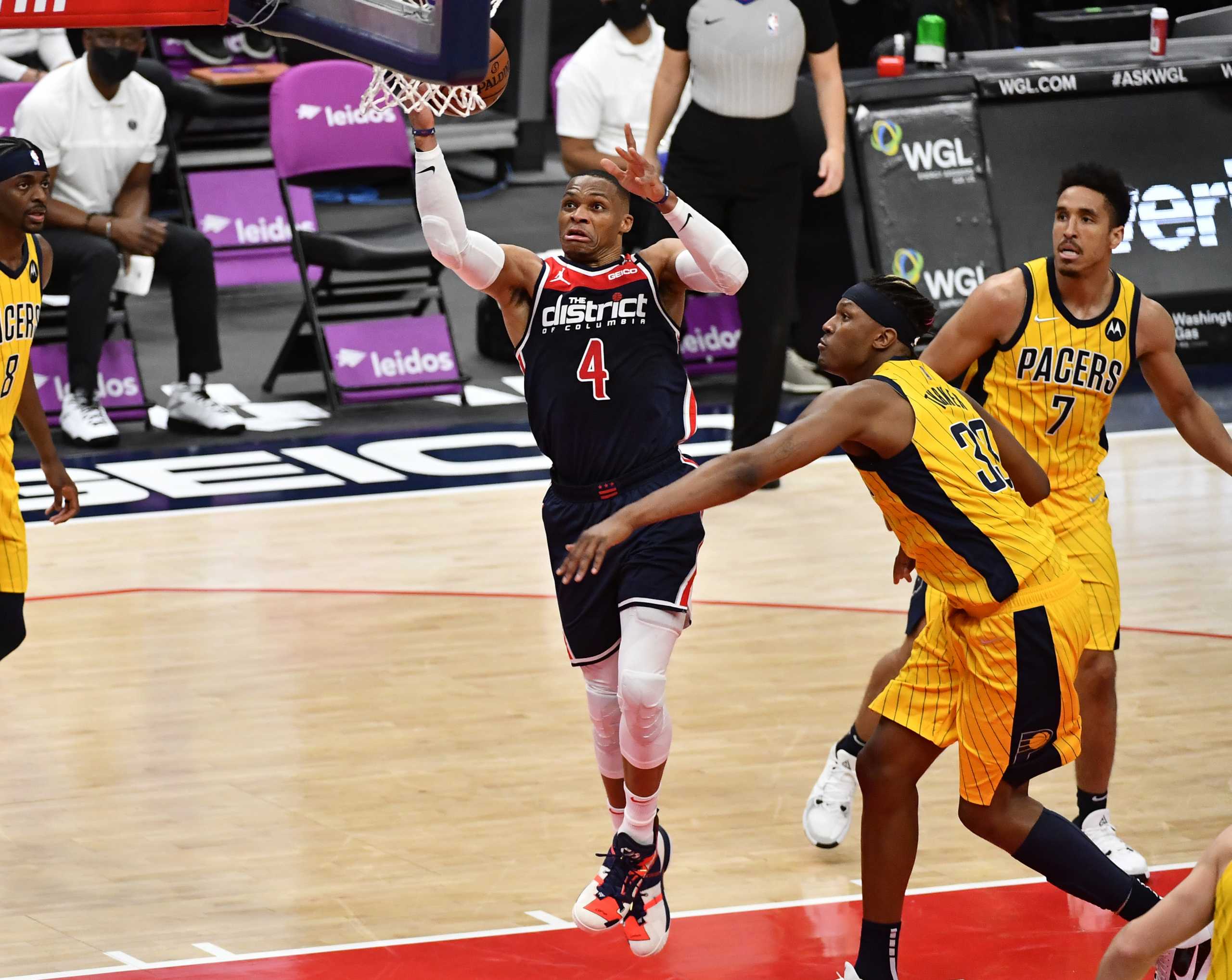 Mar 29, 2021; Washington, District of Columbia, USA; Washington Wizards guard Russell Westbrook (4) shoots the ball against Indiana Pacers center Myles Turner (33) during the second quarter at Capital One Arena. Mandatory Credit: Brad Mills-USA TODAY Sports