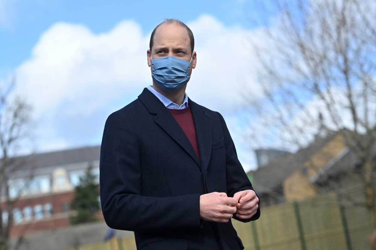 Britain's Prince William reacts to a question from the media as he leaves from a visit to the School 21 following its re-opening after the easing of coronavirus disease (COVID-19) lockdown restrictions in east London, Britain March 11, 2021. Justin Tallis