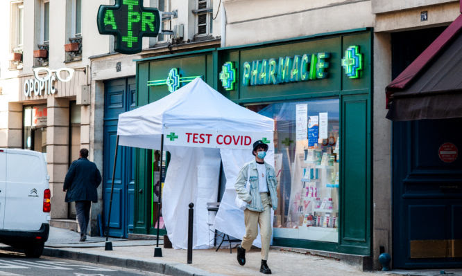 Deployment of COVID-19 antigenic testing tents outdoors, in front of a pharmacy in Paris, France. November 12, 2020