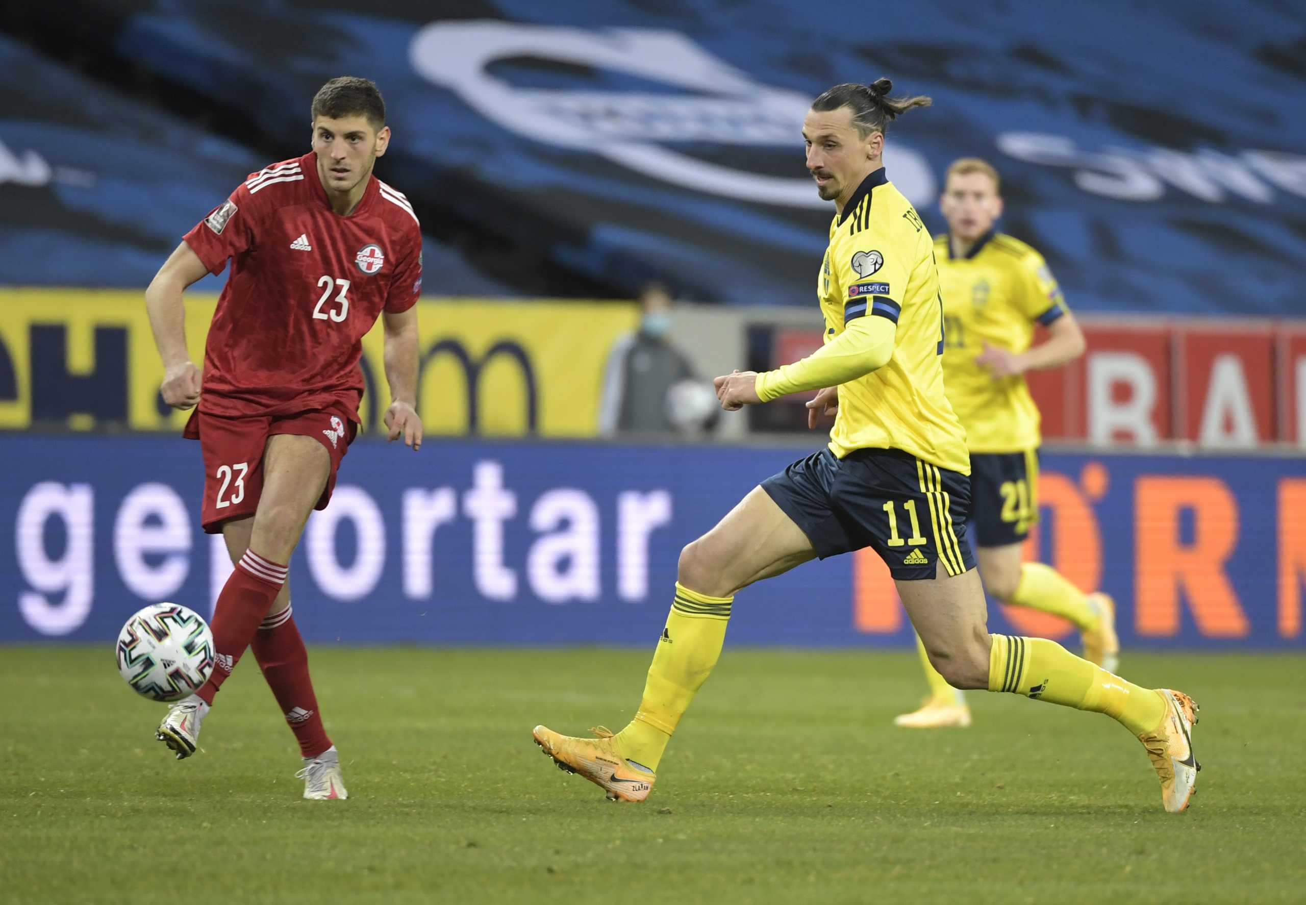 Soccer Football - World Cup Qualifiers Europe - Group B - Sweden v Georgia - Friends Arena, Stockholm, Sweden - March 25, 2021 Sweden's Zlatan Ibrahimovic in action with Georgia's Lasha Dvali TT News Agency via REUTERS