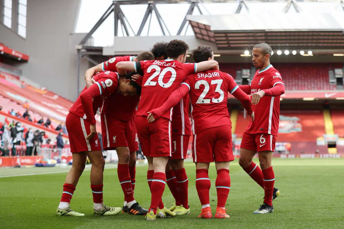 Soccer Football - Premier League - Liverpool v Aston Villa - Anfield, Liverpool, Britain - April 10, 2021 Liverpool's Trent Alexander-Arnold celebrates scoring their second goal with teammates Pool via REUTERS
