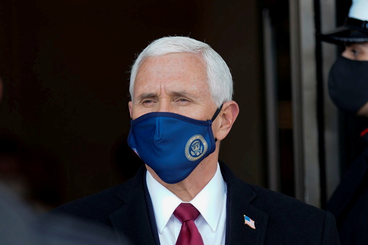 FILE PHOTO: Former Vice President Mike Pence departs after the inauguration of U.S. President Joe Biden in Washington, U.S., January 20, 2021. Melina Mara