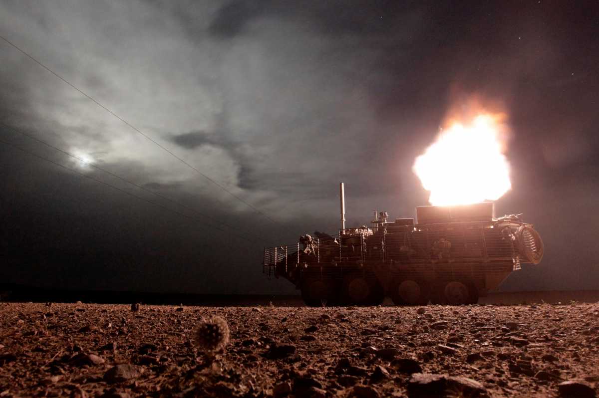 FILE PHOTO: A Stryker armoured vehicle from the U.S. Army's MGS Platoon, Alpha Company, 4-23 Infantry Battalion, 5th Stryker Brigade Combat Team fires a 120mm mortar during a night patrol in Kandahar, Afghanistan, April 27, 2010.         REUTERS