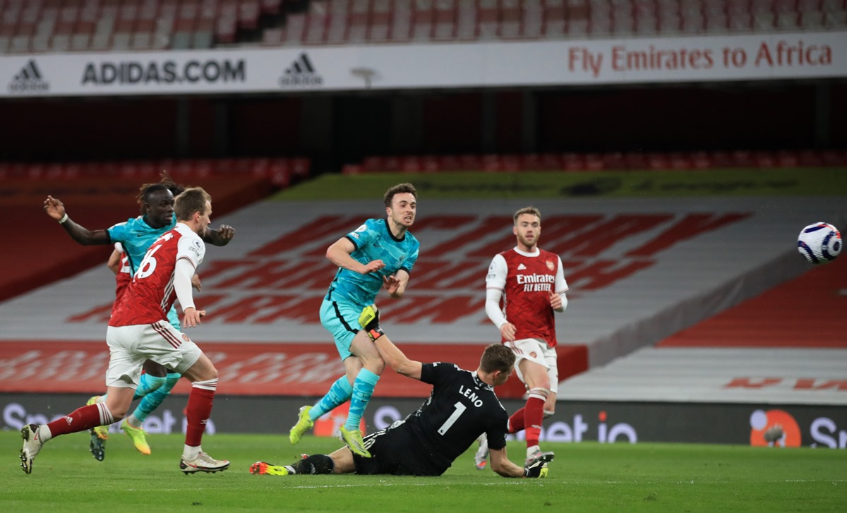Soccer Football - Premier League - Arsenal v Liverpool  - Emirates Stadium, London, Britain - April 3, 2021 Liverpool's Diogo Jota scores their third goal Pool via REUTERS