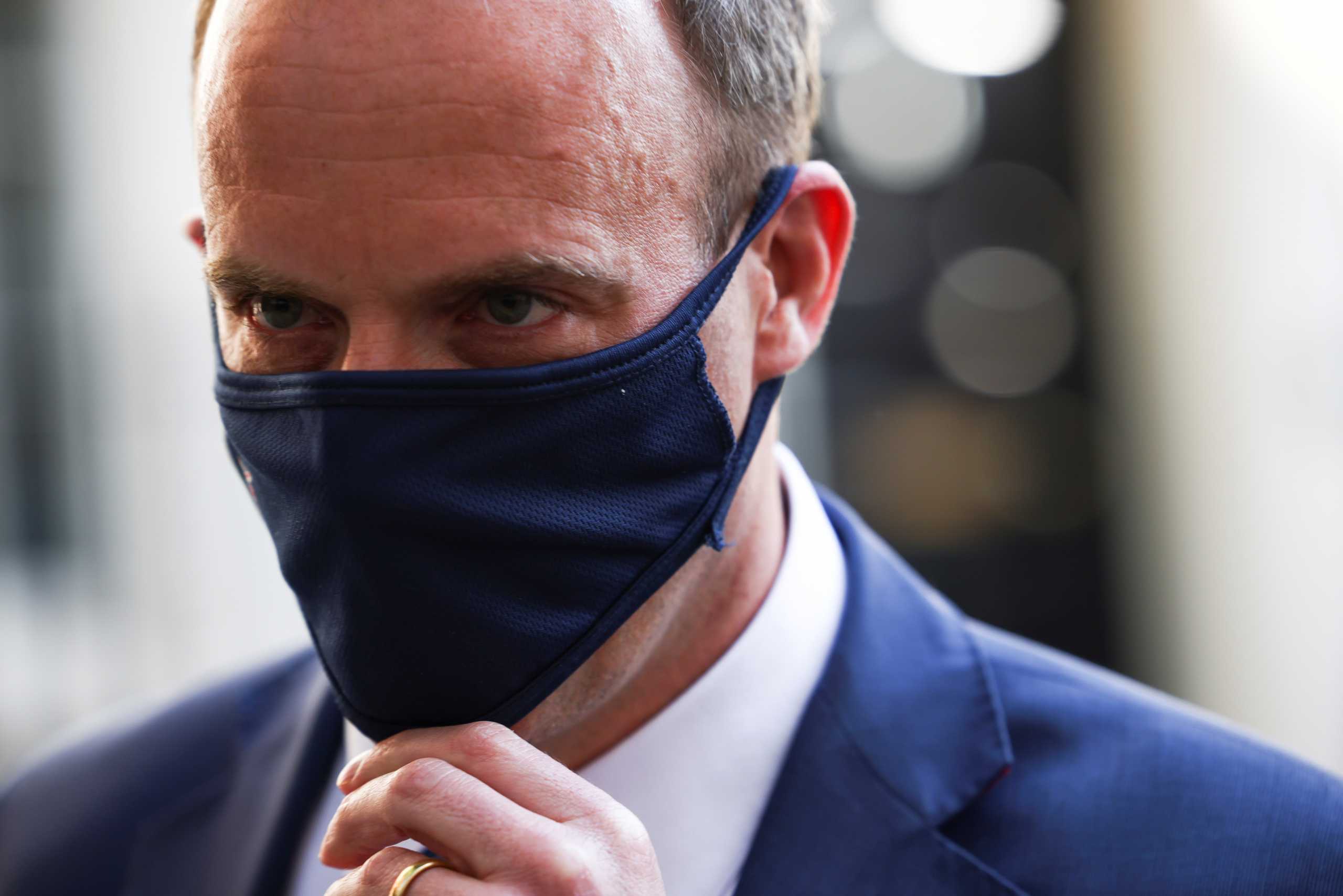 Britain's Foreign Secretary Dominic Raab leaves 10 Downing Street, in London, Britain, April 27, 2021. REUTERS