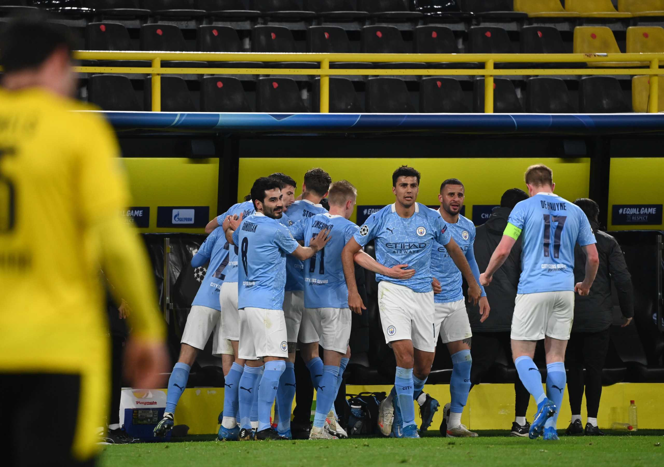 Soccer Football - Champions League - Quarter Final Second Leg - Borussia Dortmund v Manchester City - Signal Iduna Park, Dortmund, Germany - April 14, 2021 Manchester City's Phil Foden celebrates scoring their second goal with teammates Pool via REUTERS