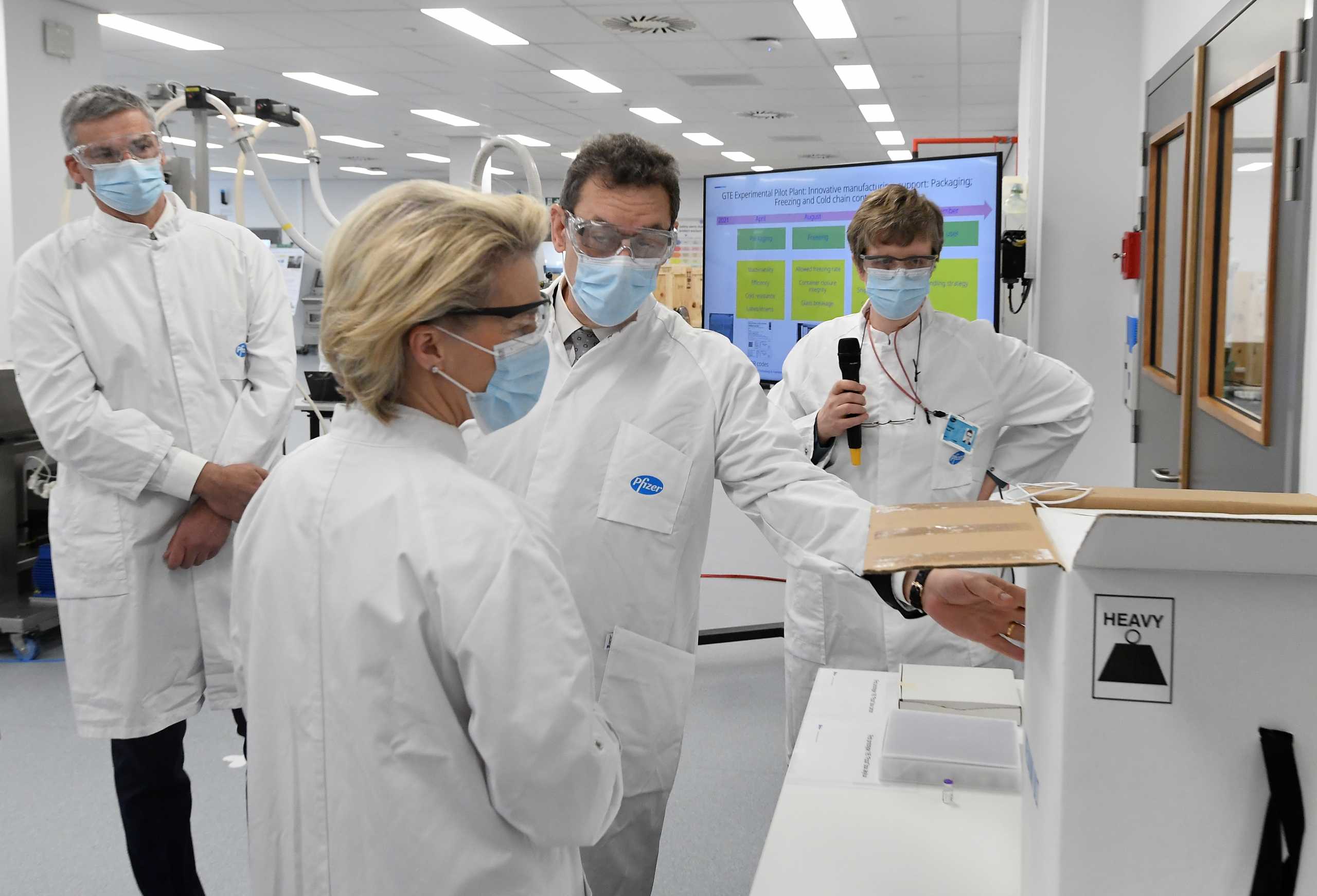 European Commission President Ursula von der Leyen talks with Pfizer CEO Albert Bourla during a visit at the factory of U.S. pharmaceutical company Pfizer in Puurs, Belgium April 23, 2021.  John Thys