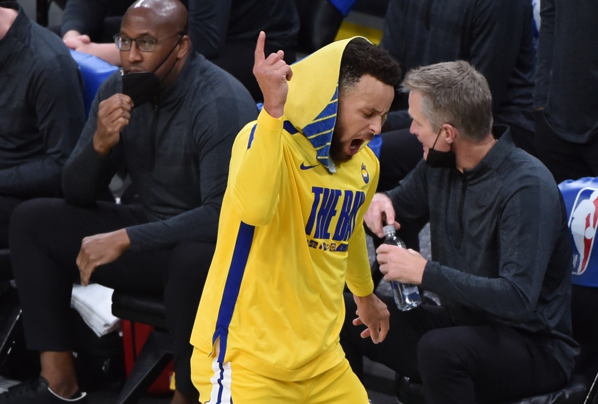 Apr 17, 2021; Boston, Massachusetts, USA; Golden State Warriors guard Stephen Curry (30) reacts on the sidelines after a foul on the court by the Boston Celtics during the first half at TD Garden. Mandatory Credit: Bob DeChiara-USA TODAY Sports