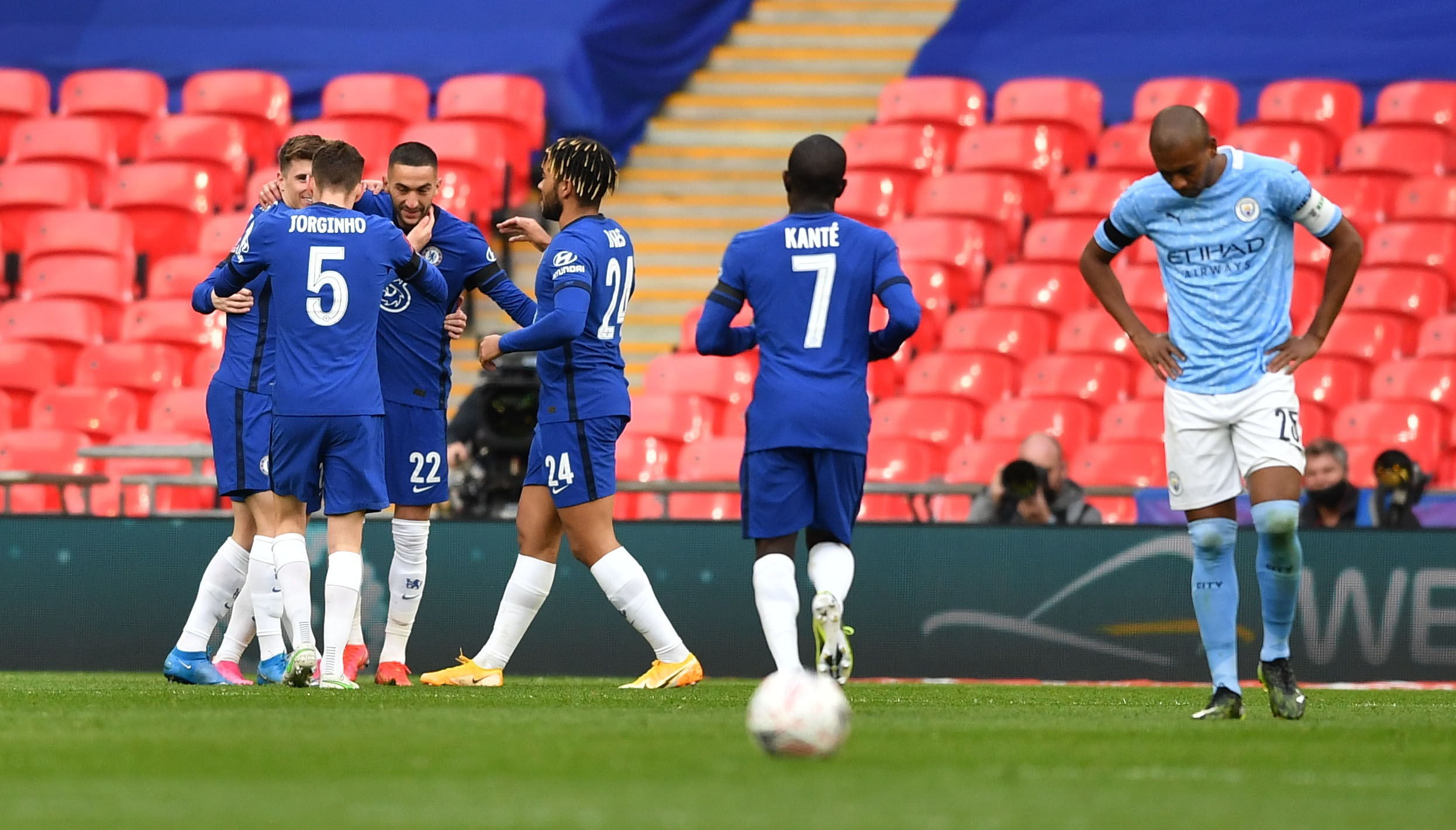 Soccer Football -  FA Cup Semi Final - Chelsea v Manchester City - Wembley Stadium, London, Britain - April 17, 2021 Chelsea's Hakim Ziyech celebrates scoring their first goal with teammates Pool via REUTERS