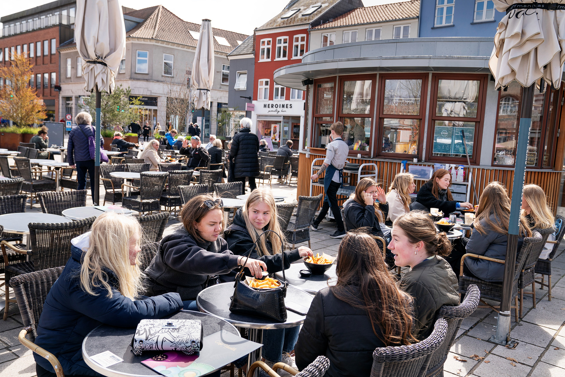 People enjoy outdoor service as cafes, bars and restaurants reopen due to COVID-19 restrictions easing in Roskilde, Denmark April 21, 2021. Claus Bech
