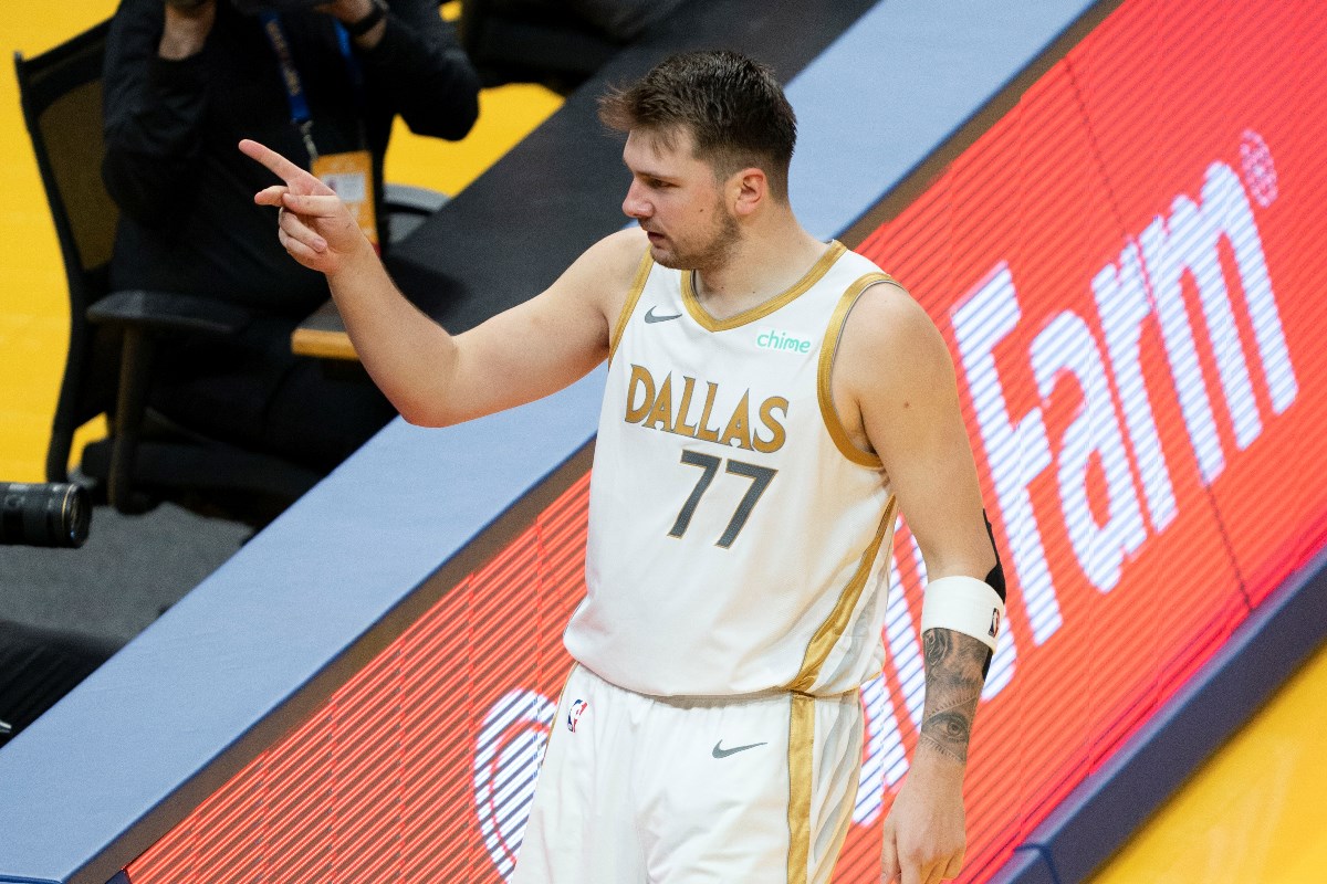 April 27, 2021; San Francisco, California, USA; Dallas Mavericks guard Luka Doncic (77) celebrates against the Golden State Warriors during the third quarter at Chase Center. Mandatory Credit: Kyle Terada-USA TODAY Sports