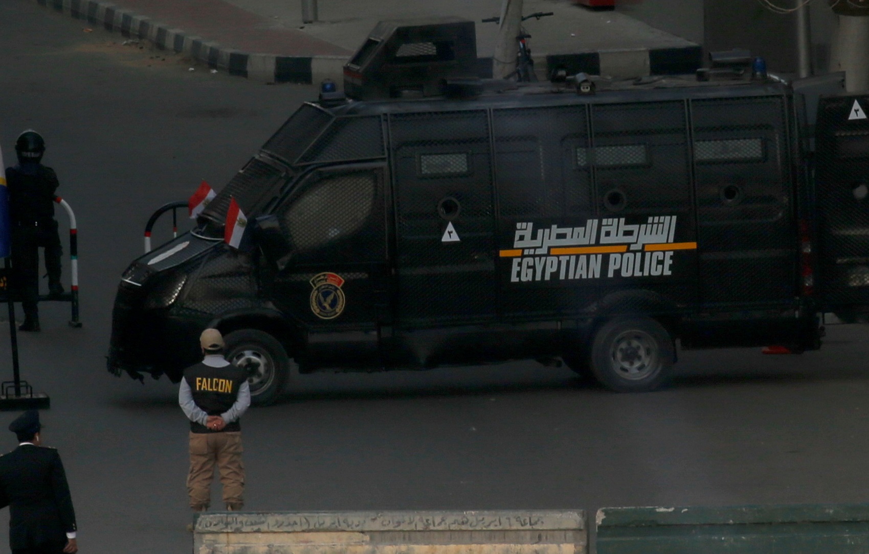 A police vehicle secures the entrance to Tahrir Square as royal mummies are transported in a convoy from the Egyptian Museum in Tahrir to the National Museum of Egyptian Civilization in Fustat, in Cairo, Egypt April 3, 2021. REUTERS