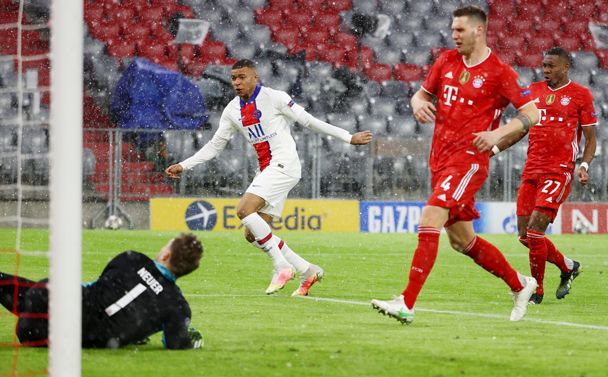 Soccer Football - Champions League - Quarter Final First Leg - Bayern Munich v Paris St Germain - Allianz Arena, Munich, Germany - April 7, 2021 Paris St Germain's Kylian Mbappe scores their first goal REUTERS
