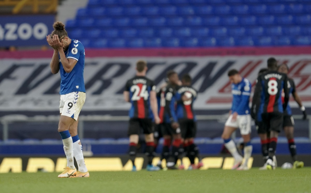 Soccer Football - Premier League - Everton v Crystal Palace - Goodison Park, Liverpool, Britain - April 5, 2021 Everton's Dominic Calvert-Lewin looks dejected after Michy Batshuayi scored Crystal Palace's first goal Pool via REUTERS
