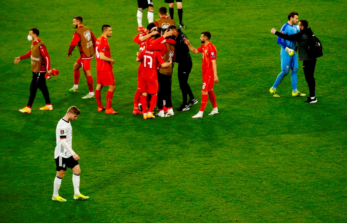 Soccer Football - World Cup Qualifiers Europe - Group J - Germany v North Macedonia - MSV-Arena, Duisburg, Germany - March 31, 2021 Germany's Timo Werner looks dejected as the North Macedonia players celebrate after the match Pool via REUTERS