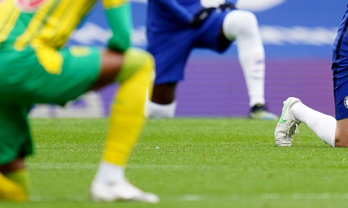 Soccer Football - Premier League - Chelsea v West Bromwich Albion - Stamford Bridge, London, Britain - April 3, 2021 Chelsea's Jorginho takes a knee in support of the Black Lives Matter campaign before the match Pool via REUTERS