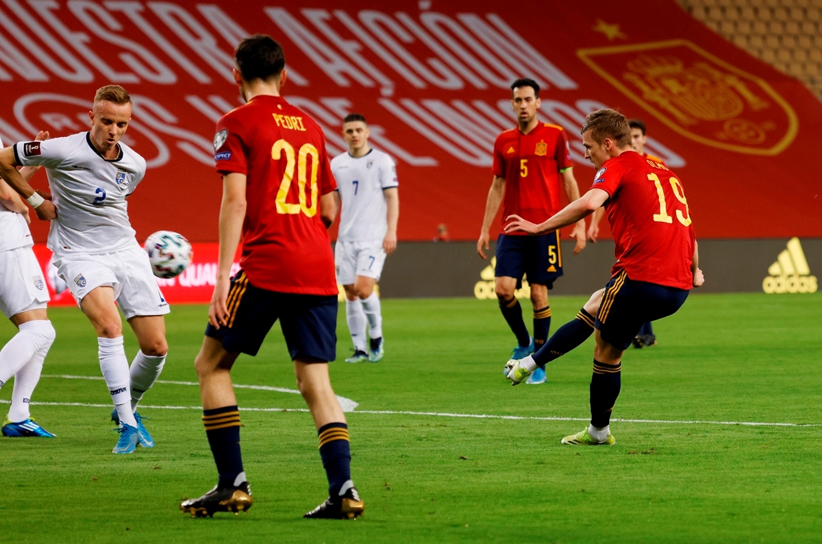 Soccer Football - World Cup Qualifiers Europe - Group B - Spain v Kosovo - Estadio La Cartuja de Sevilla, Seville, Spain - March 31, 2021 Spain's Dani Olmo scores their first goal REUTERS