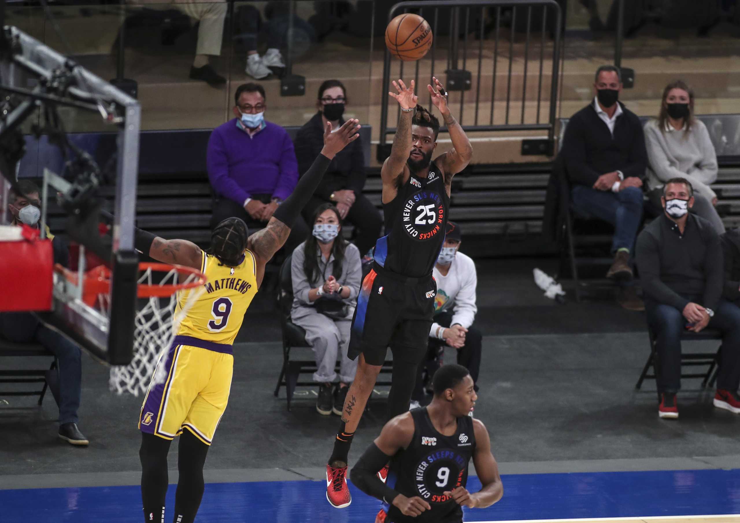 Apr 12, 2021; New York, New York, USA;  New York Knicks forward Reggie Bullock (25) shoots the ball against the Los Angeles Lakers in the third quarter at Madison Square Garden. Mandatory Credit: Wendell Cruz-USA TODAY Sports