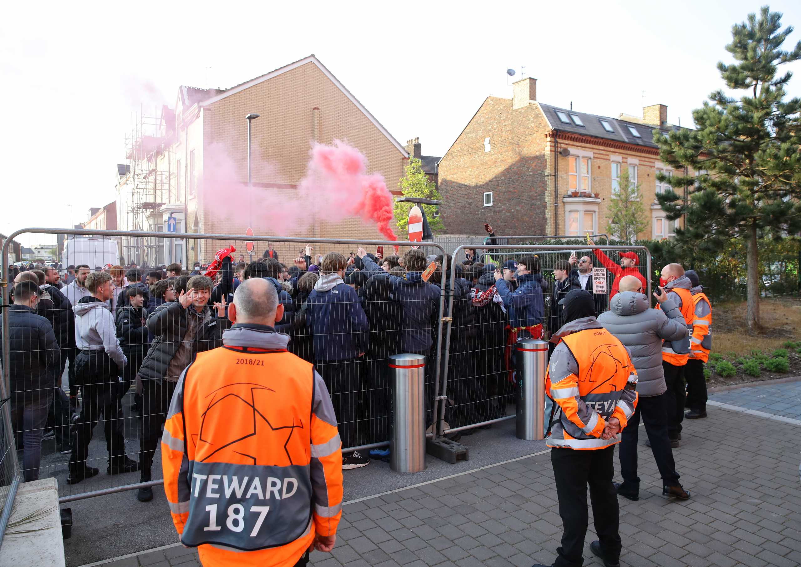 Soccer Football - Champions League - Quarter Final Second Leg - Liverpool v Real Madrid - Anfield, Liverpool, Britain - April 14, 2021 Liverpool fans are seen outside the stadium before the match REUTERS