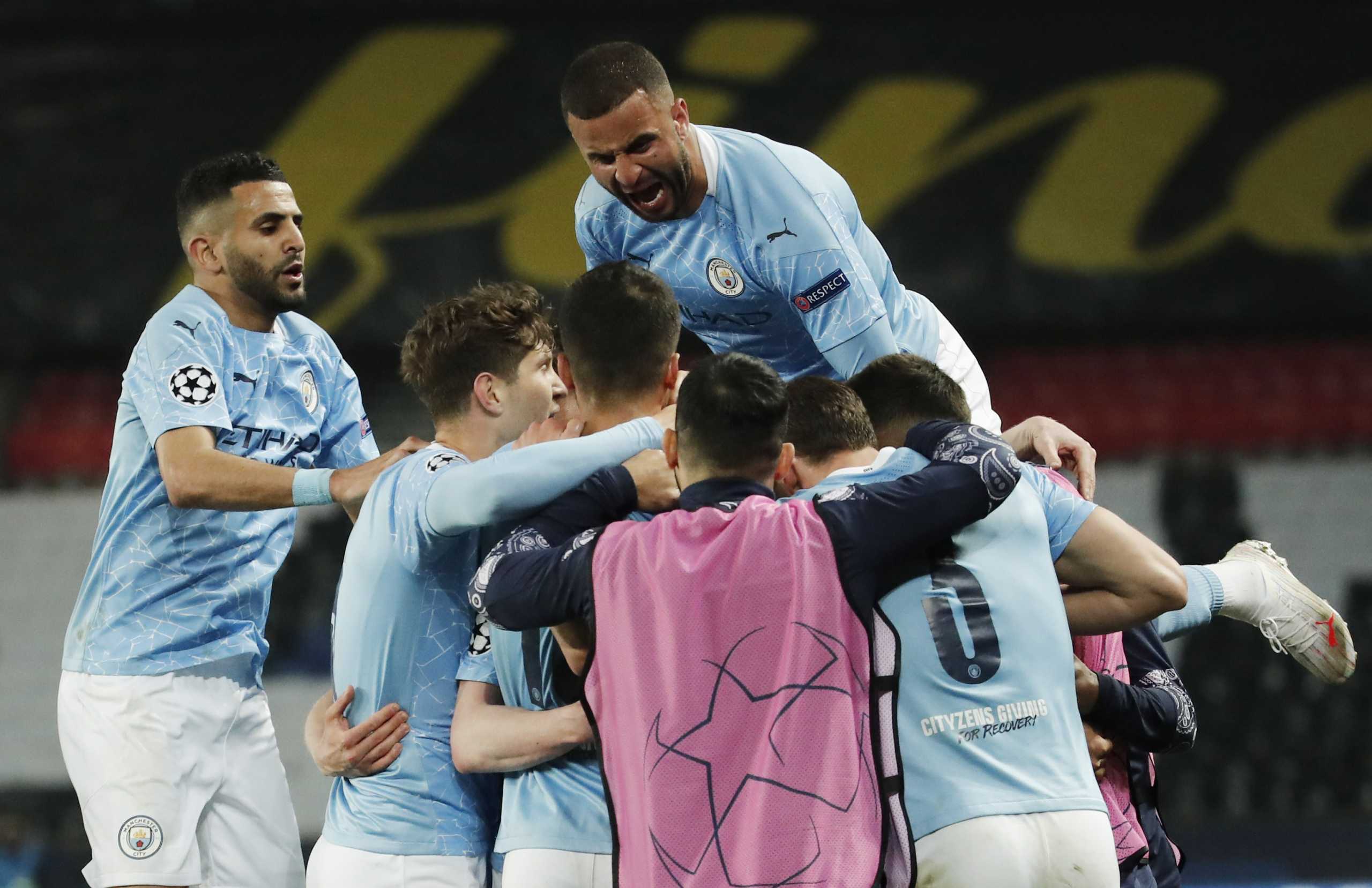 Soccer Football - Champions League - Semi Final First Leg - Paris St Germain v Manchester City - Parc des Princes, Paris, France - April 28, 2021 Manchester City's Kevin De Bruyne celebrates scoring their first goal with Riyad Mahrez, Kyle Walker and teammates REUTERS