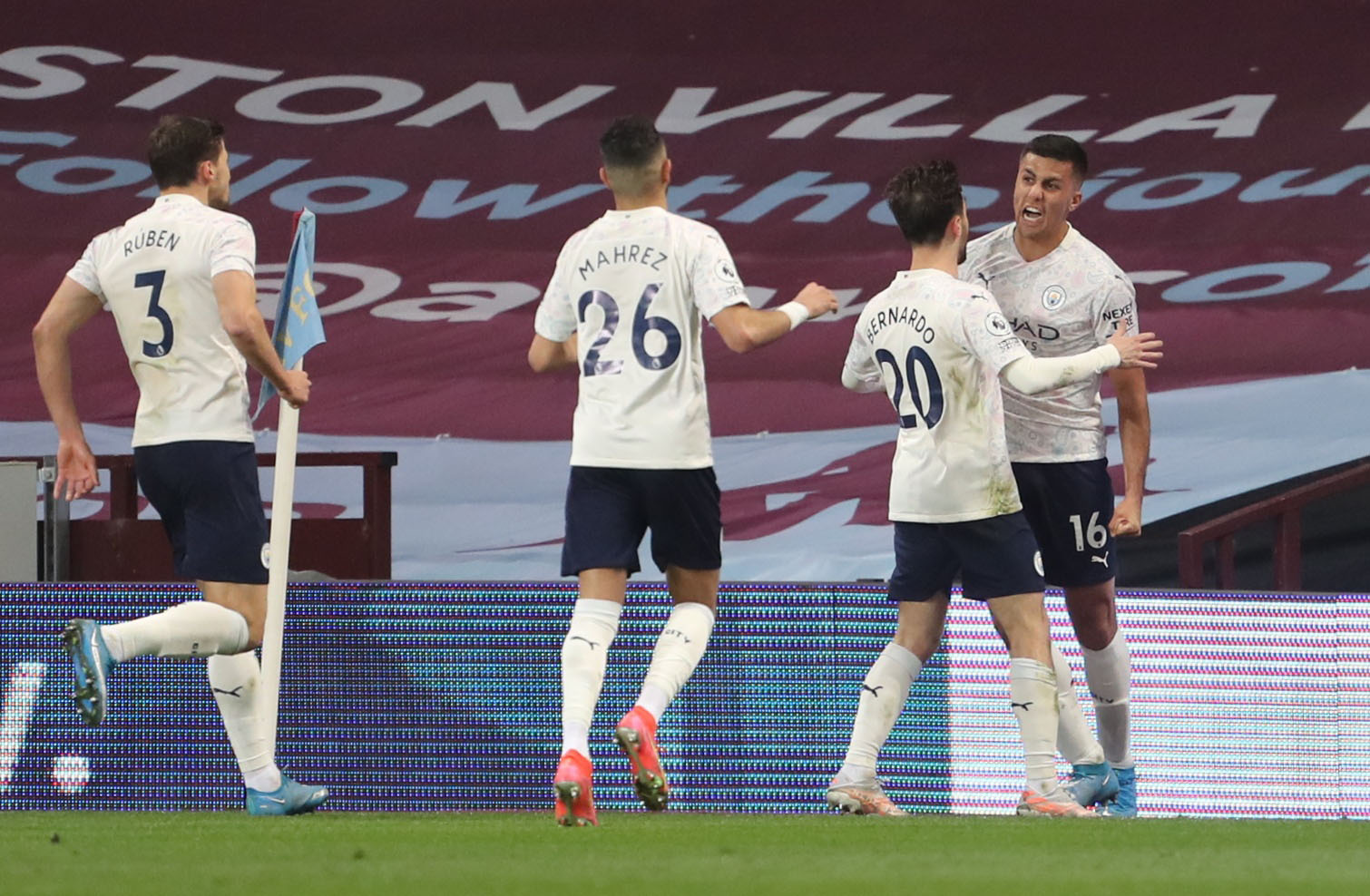 Soccer Football - Premier League - Aston Villa v Manchester City - Villa Park, Birmingham, Britain - April 21, 2021 Manchester City's Rodrigo celebrates scoring their second goal with Bernardo Silva REUTERS