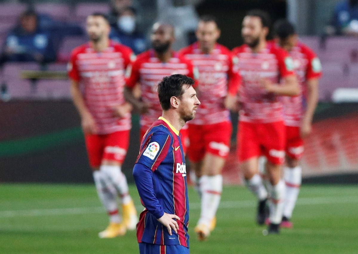 Soccer Football - La Liga Santander - FC Barcelona v Granada - Camp Nou, Barcelona, Spain - April 29, 2021 Barcelona's Lionel Messi looks dejected after Granada's Jorge Molina scored their second goal REUTERS