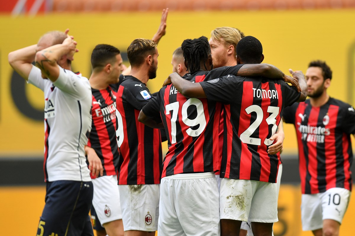 Soccer Football - Serie A - AC Milan v Genoa - San Siro, Milan, Italy - April 18, 2021 AC Milan players celebrate after Genoa's Gianluca Scamacca scored an own goal and AC Milan's second REUTERS