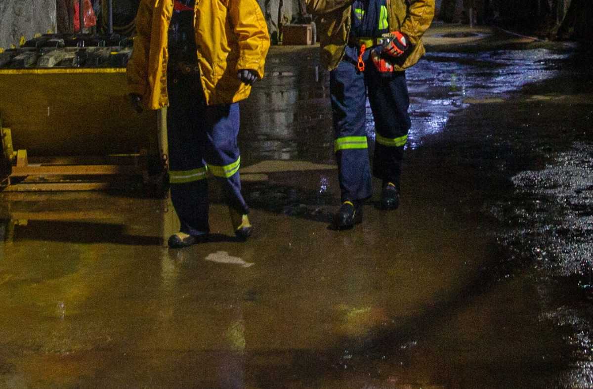 Mine workers walk 6780 ft (2066 m) underground in the Resolution Copper exploratory mine shaft 10 in Superior, Arizona, U.S., March 30, 2021. Picture taken March 30, 2021.  REUTERS