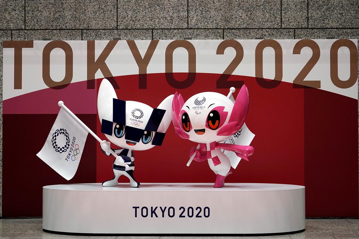 The statues of Miraitowa, left, and Someity, right, the official mascots for the Tokyo 2020 Olympics and Paralympics, are seen at an unveiling event marking 100 days before the start of the Olympic Games, at the Tokyo Metropolitan Government building, in Tokyo, Japan, April 14, 2021. Eugene Hoshiko