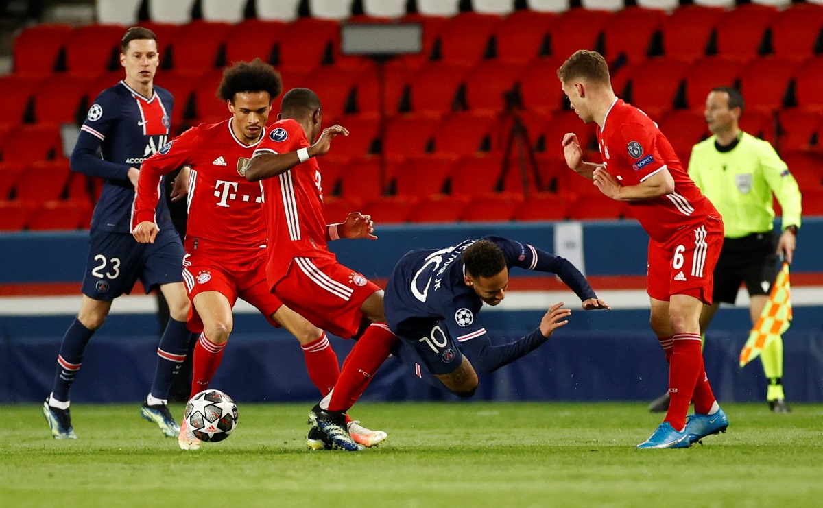Soccer Football - Champions League - Quarter Final Second Leg - Paris St Germain v Bayern Munich - Parc des Princes, Paris, France - April 13, 2021 Bayern Munich's Leroy Sane in action with Paris St Germain's Neymar REUTERS