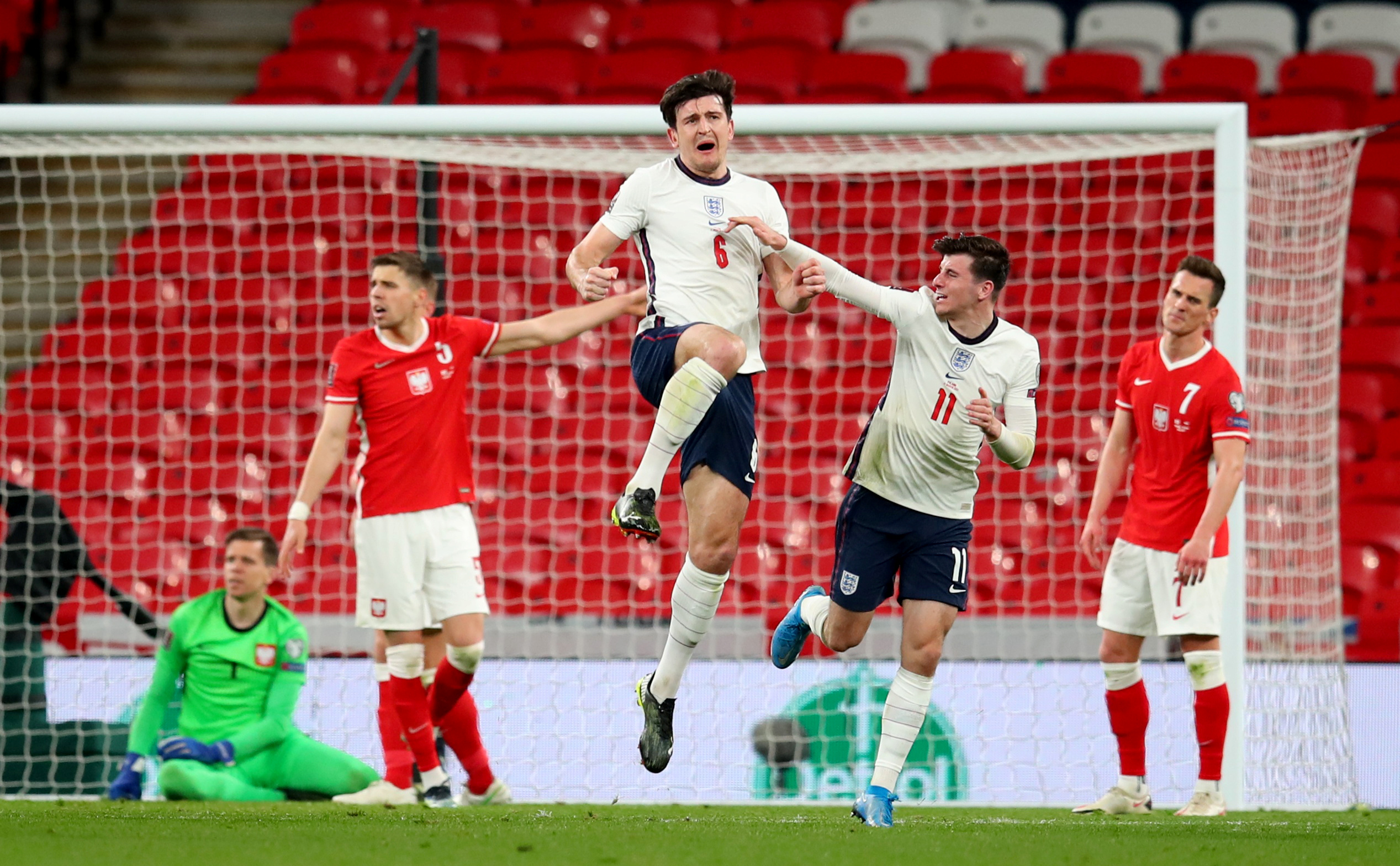 Soccer Football - World Cup Qualifiers Europe - Group I - England v Poland - Wembley Stadium, London, Britain - March 31, 2021 England's Harry Maguire celebrates scoring their second goal with Mason Mount Pool via REUTERS