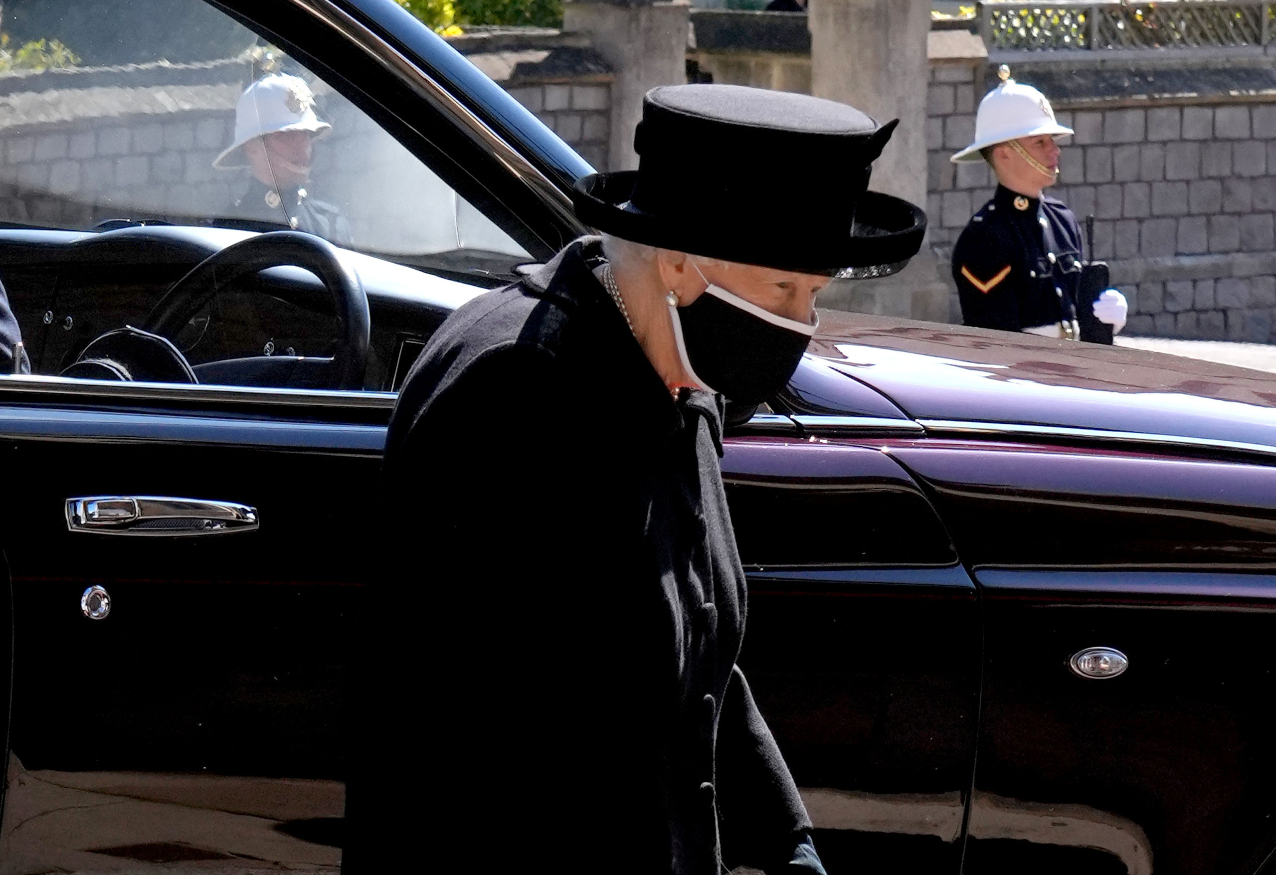 FILE PHOTO: Britain's Queen Elizabeth II arrives for the funeral of Britain's Prince Philip, who died at the age of 99, at St George's Chapel, in Windsor, Britain, April 17, 2021. Jonathan Brady