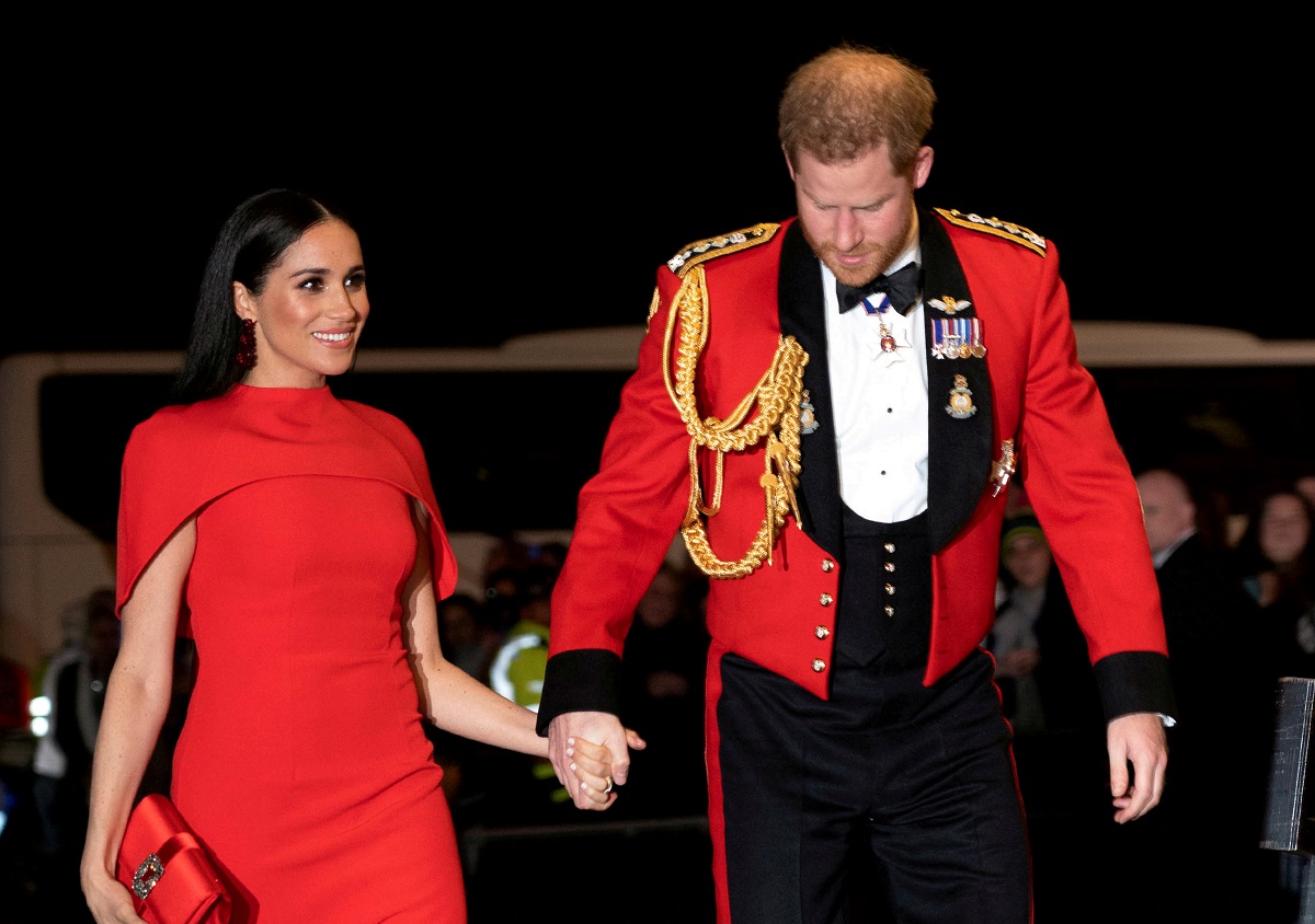 FILE PHOTO: Britain's Prince Harry and his wife Meghan, Duchess of Sussex, arrive to attend the Mountbatten Festival of Music at the Royal Albert Hall in London, Britain March 7, 2020. Chris Eades