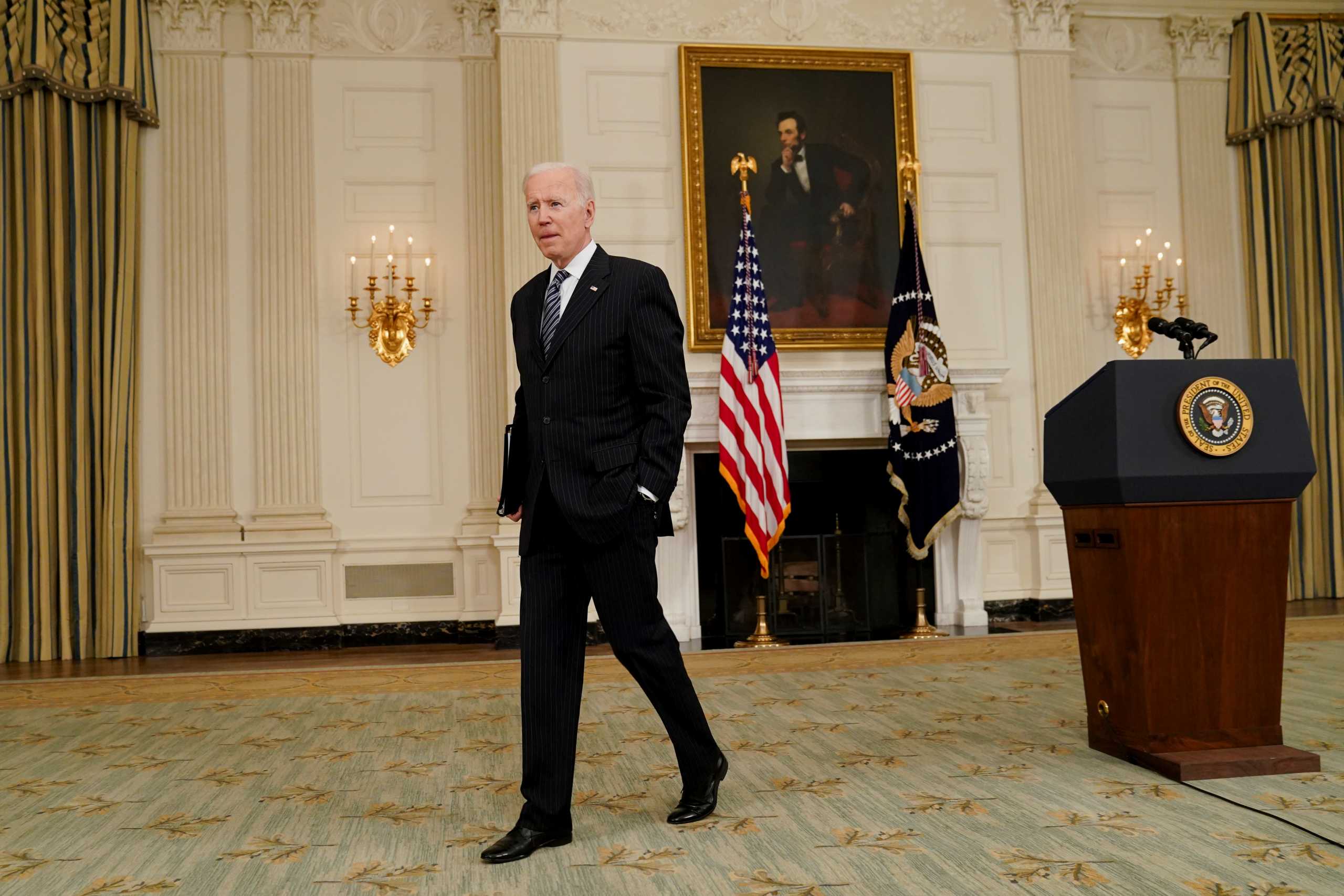 U.S. President Joe Biden walks after delivering remarks on the state of the coronavirus disease (COVID-19) vaccinations from the State Dining Room at the White House in Washington, D.C., U.S., April 6, 2021. REUTERS