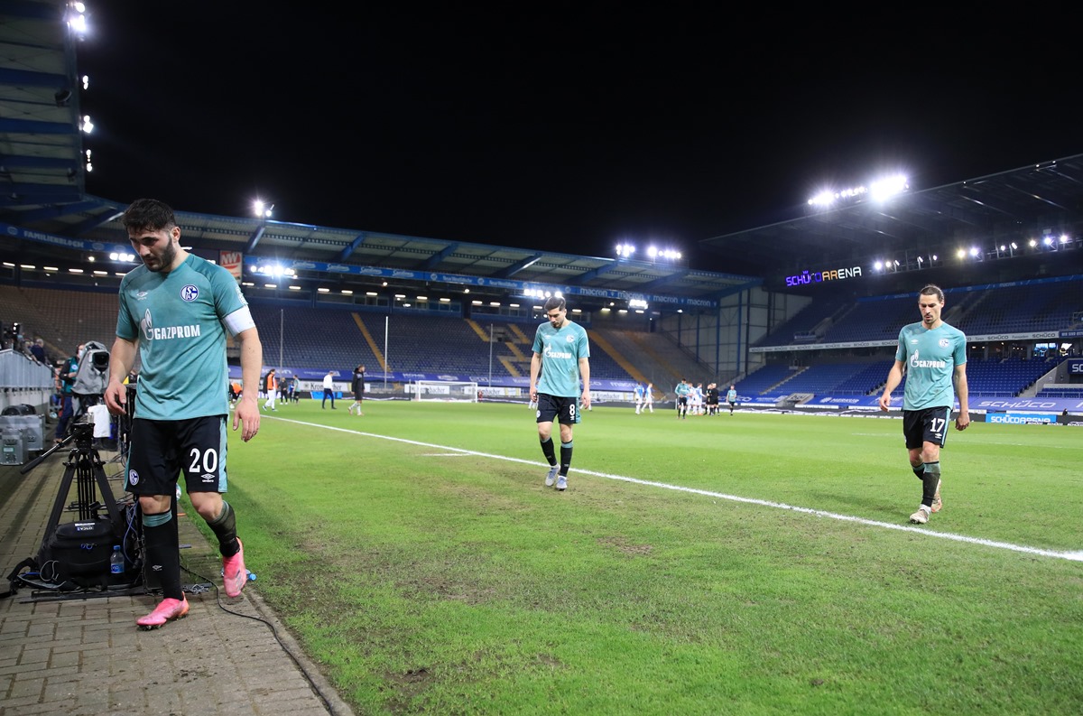Soccer Football - Bundesliga - Arminia Bielefeld v Schalke 04 - Bielefelder Alm, Bielefeld, Germany - April 20, 2021 Schalke 04's Sead Kolasinac and teammates after being relegated from the Bundesliga Pool via REUTERS
