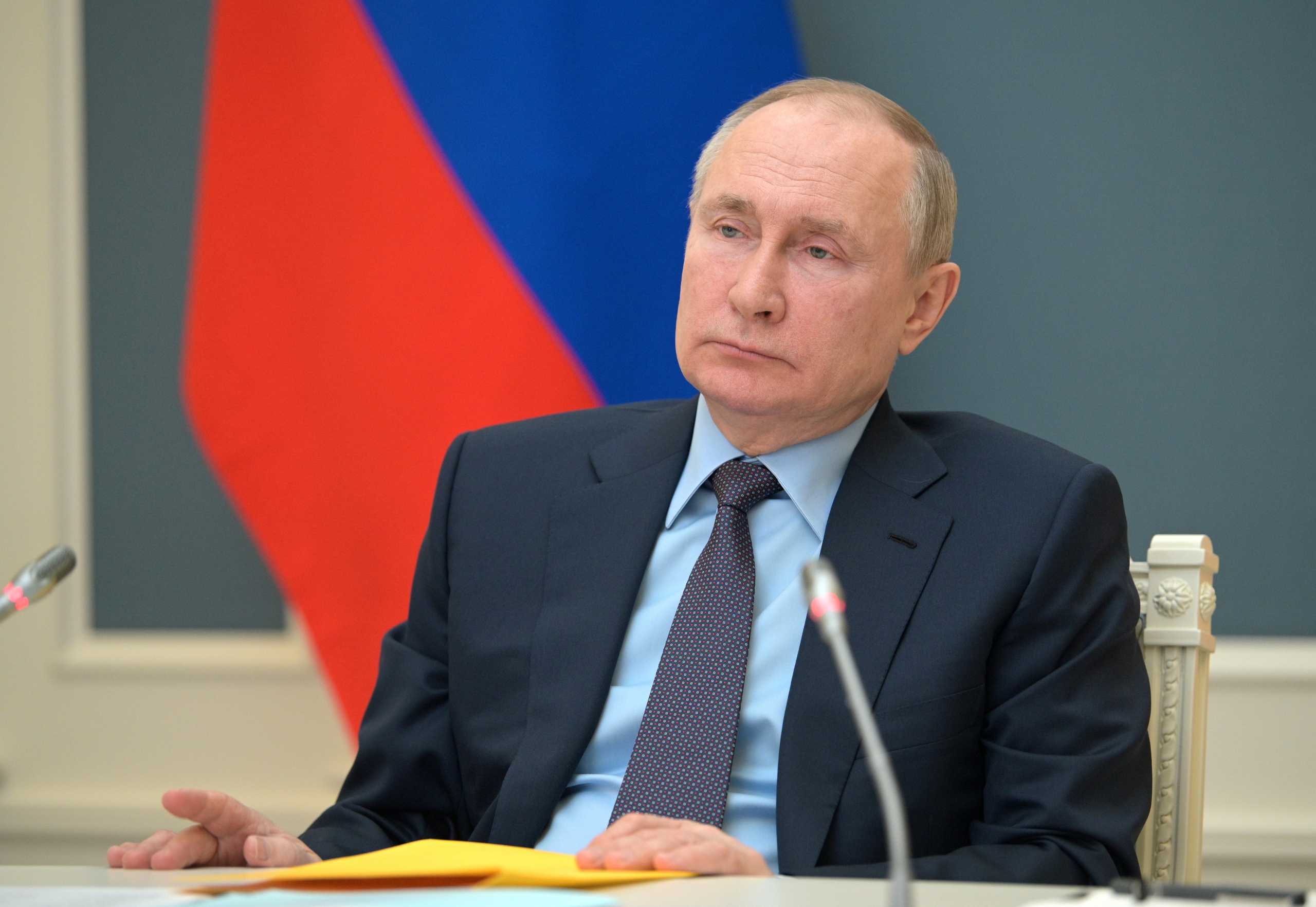 FILE PHOTO: Russian President Vladimir Putin attends a session of the board of trustees of the Russian Geographical Society via a video conference call in Moscow, Russia April 14, 2021. Sputnik