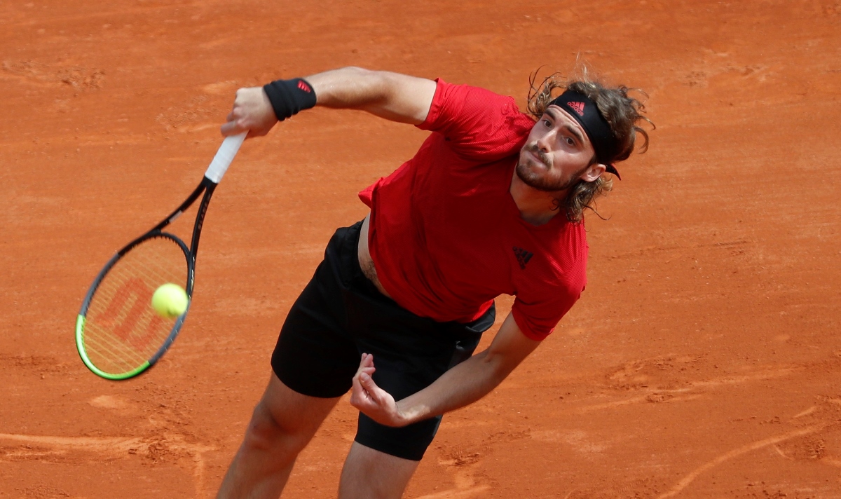 Tennis - ATP Masters 1000 - Monte Carlo Masters - Monte-Carlo Country Club, Roquebrune-Cap-Martin, France - April 13, 2021 Greece's Stefanos Tsitsipas in action during his second round match against Russia's Aslan Karatsev REUTERS