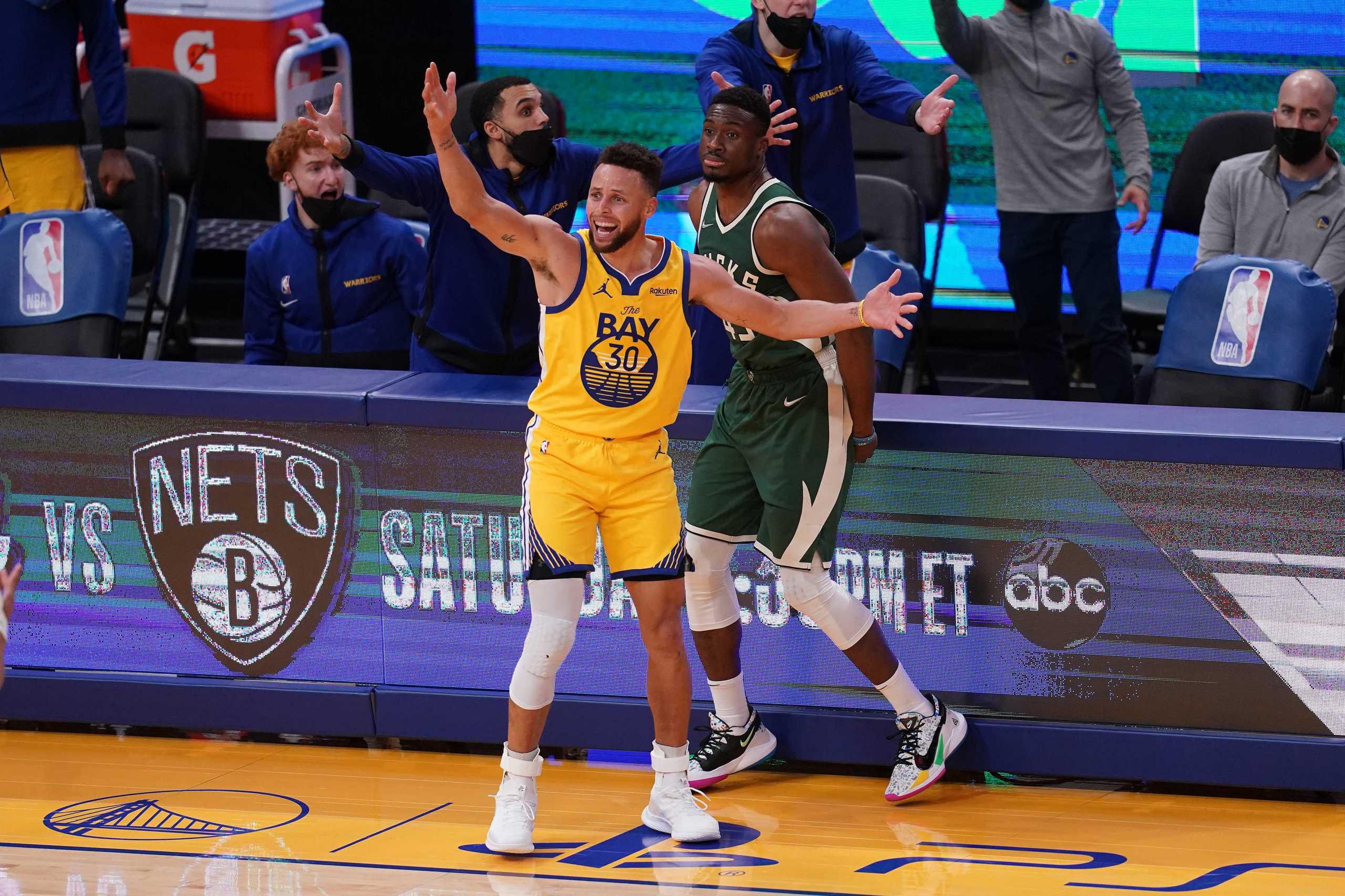 Apr 6, 2021; San Francisco, California, USA; Golden State Warriors guard Stephen Curry (30) reacts after being fouled by Milwaukee Bucks forward Thanasis Antetokounmpo (43) in the third quarter at the Chase Center. Mandatory Credit: Cary Edmondson-USA TODAY Sports