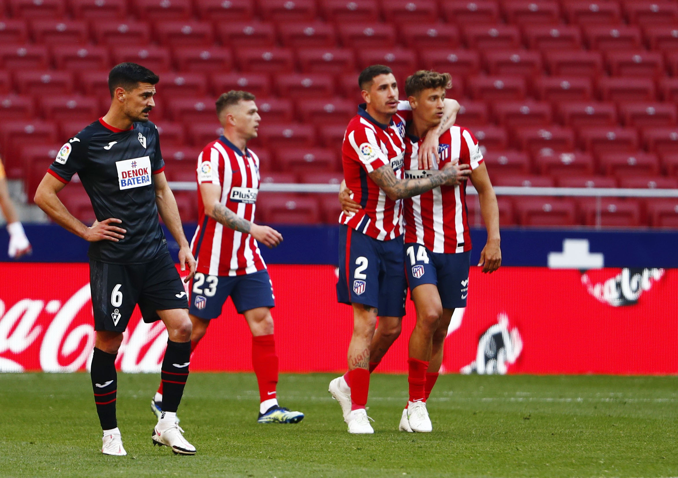 Soccer Football - La Liga Santander - Atletico Madrid v Eibar - Wanda Metropolitano, Madrid, Spain - April 18, 2021 Atletico Madrid's Marcos Llorente celebrates scoring their fifth goal with Jose Gimenez REUTERS