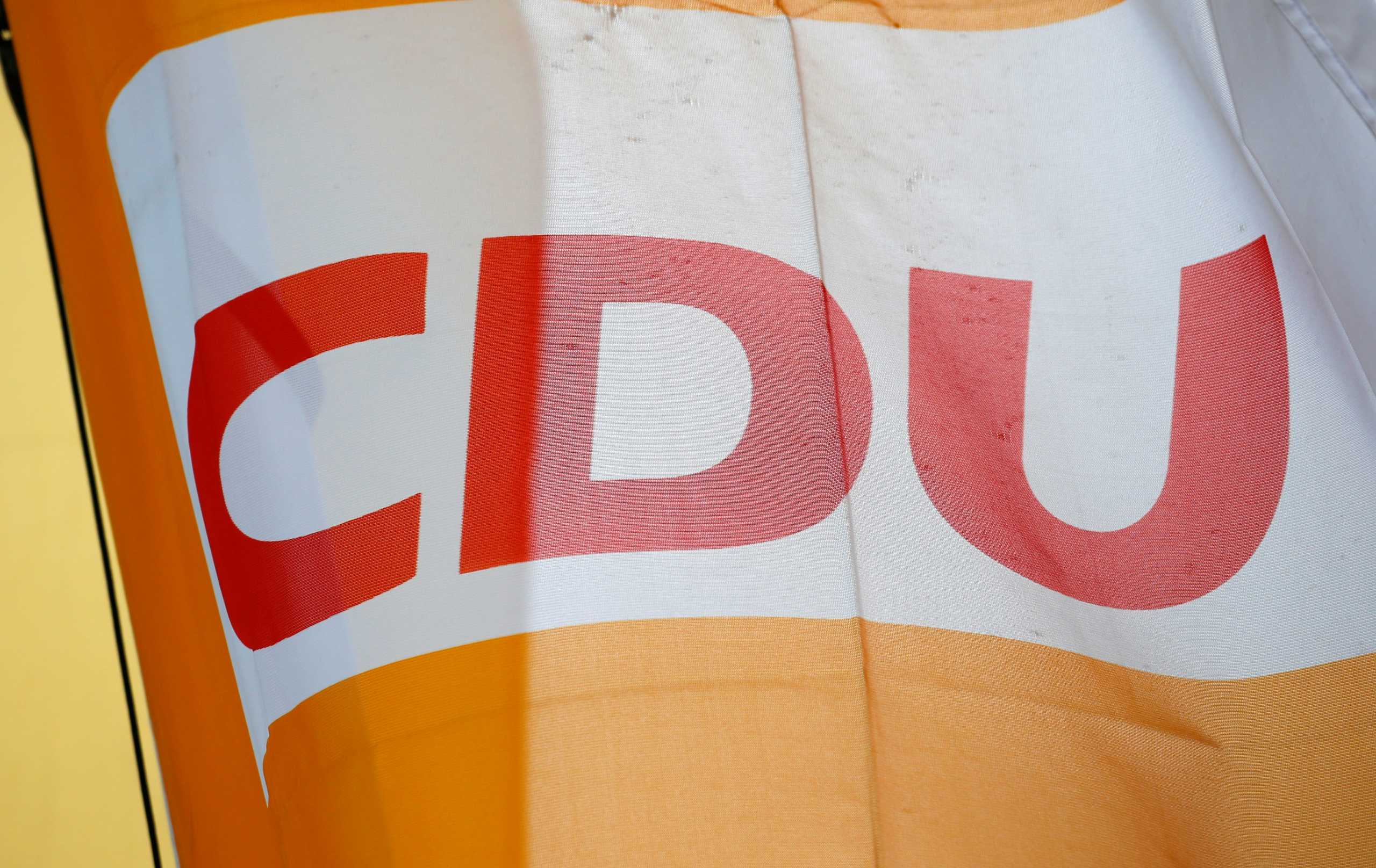 A logo of Christian Democratic Union party (CDU) is pictured in Berlin, Germany April 12, 2021. REUTERS