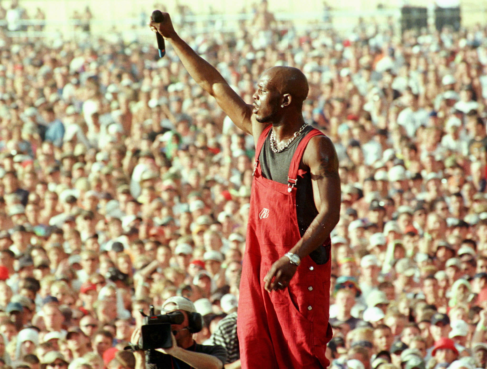FILE PHOTO: Earl Simmons, better known as rap musician DMX, performs on the main stage at the Woodstock music and arts festival in Rome, New York, U.S. July 23, 1999. REUTERS