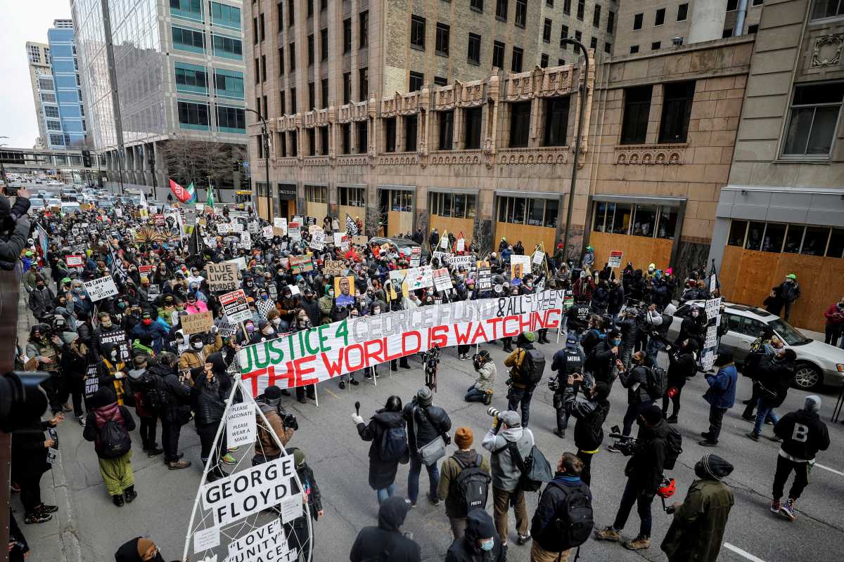 SENSITIVE MATERIAL. THIS IMAGE MAY OFFEND OR DISTURB    Demonstrators march through downtown after the closing statements in the trial of former police officer Derek Chauvin, who is facing murder charges in the death of George Floyd, in Minneapolis, Minnesota, U.S., April 19, 2021. REUTERS