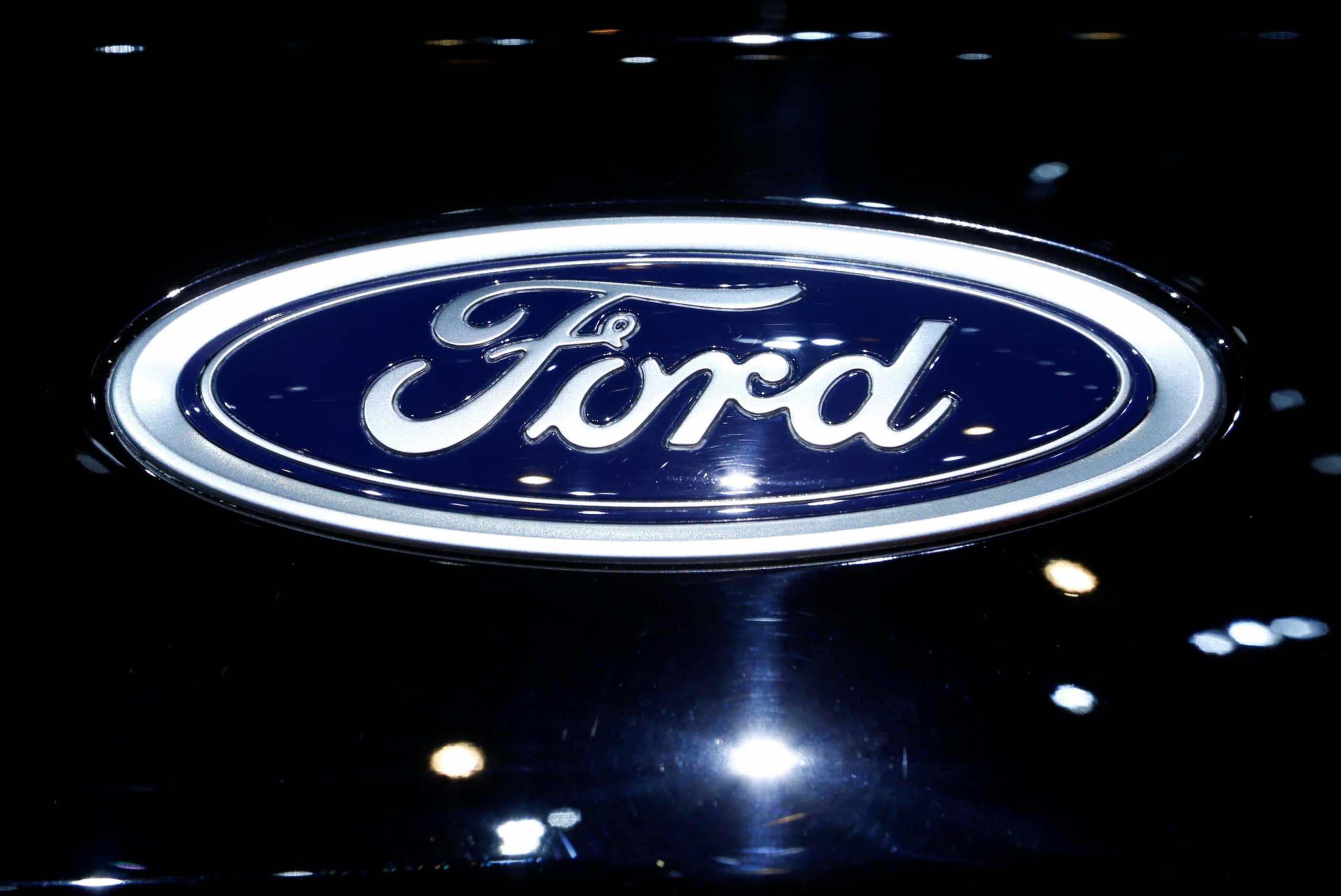 FILE PHOTO: A logo of Ford is pictured on a car at the 86th International Motor Show in Geneva, Switzerland, March 1, 2016.  REUTERS